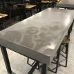 Concrete tables with etched designs 